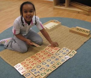 montessori girl counting Montessori student counting